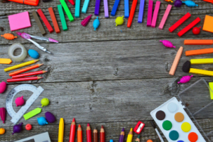 Colourful stationary on wooden background